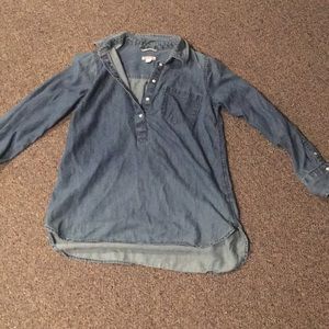 A jean material long sleeve shirt.